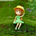 Seating Green Dress Girl