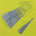 Long Silver Tassel