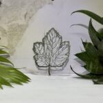 intricate silver acrylic leaf mirror 3